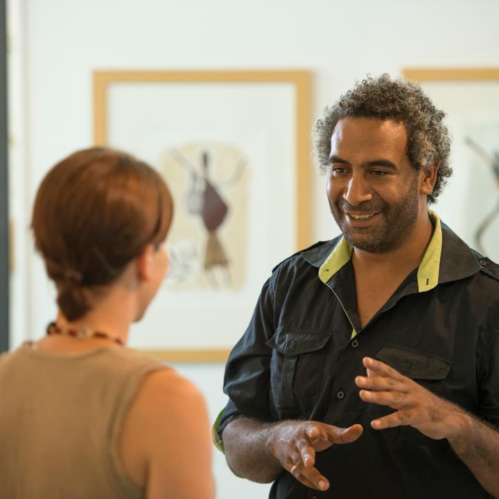 Mossman Gorge staff member assisting a visitor