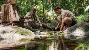 Two guides washing flora in Mossman Gorge